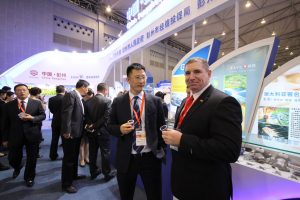 AXCEN GM Paul Grieve at the AXCEN Pavilion in China with the Trade Minister